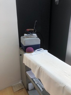 Ironing board at tailors workshop